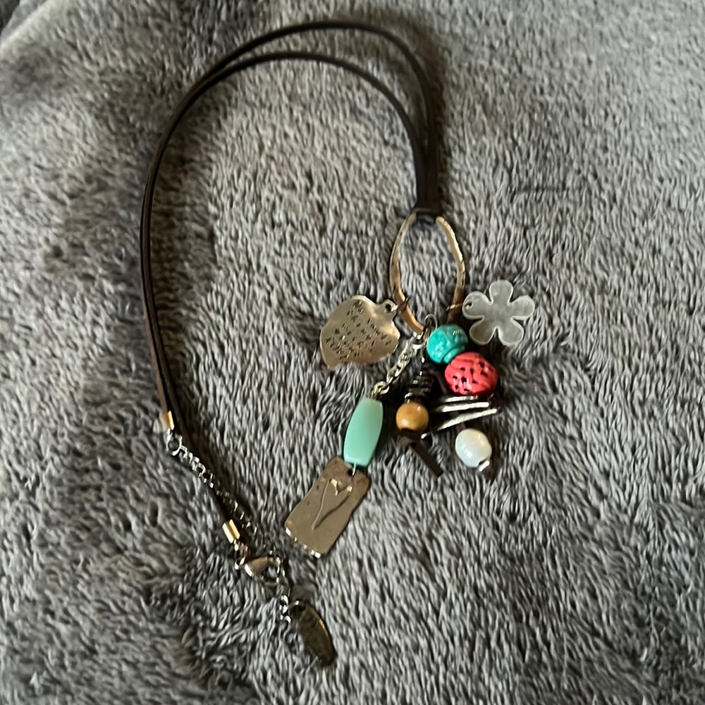 Plunder posse necklace with knotted leather chain